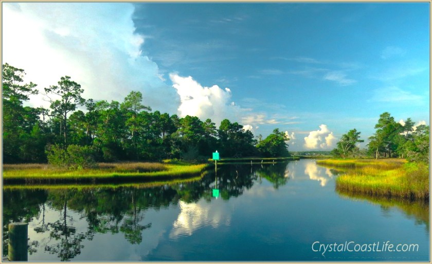 Puffy white clouds over Raymond's Gut