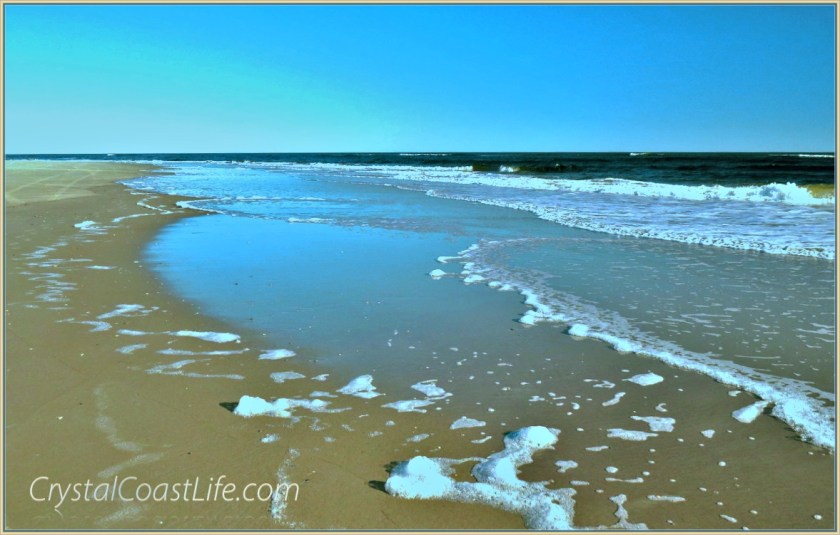 Foam On The Beach At The Point